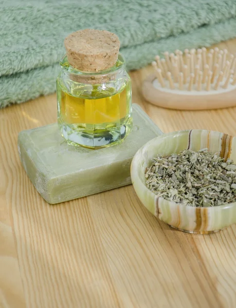 Dried herbs, oil and organic soap for skincare and haircare