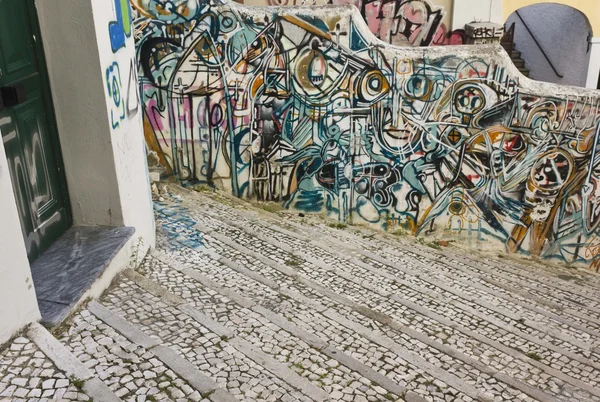 Graffiti on Calcada do Lavra street in Lisbon