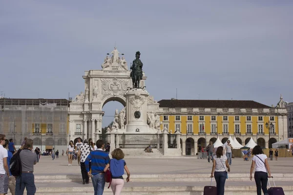 People walking in Lisbon commercial square