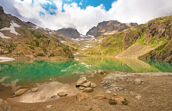The picturesque lake in the French Alps in the array Lac Blanc.  (Europe, tourism, anti-stress, relaxation - concept)
