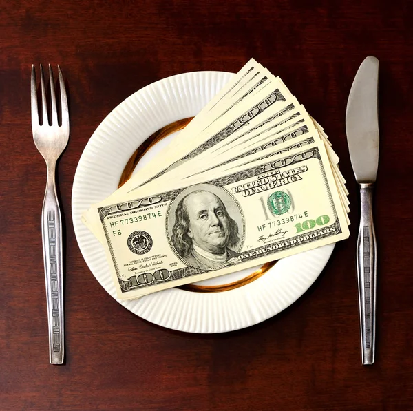 Dollars on a plate (loans, financing, financial hunger - concept