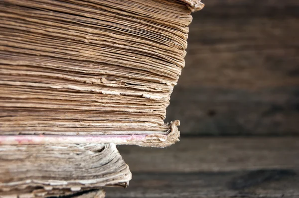 Old books on a wooden background