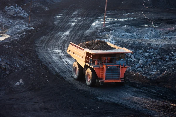 Coal-preparation plant. Big mining truck at work site coal trans