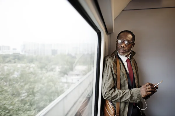 Businessman listens music