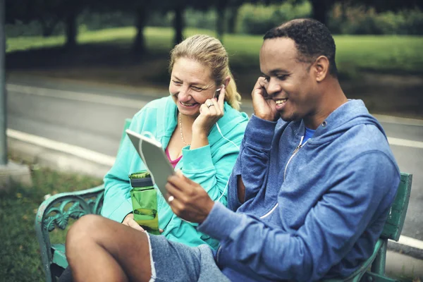 Couple Using  Digital Device