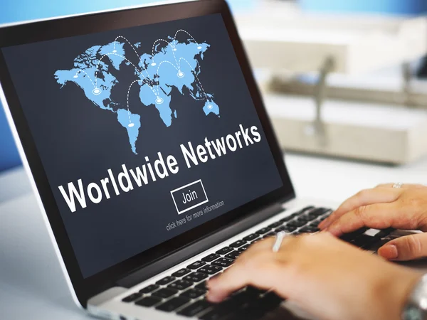 Laptop with Worldwide Networks on screen