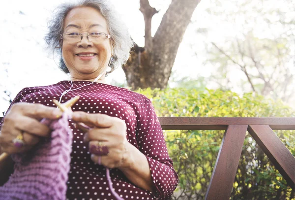 Grandma crocheting Concept