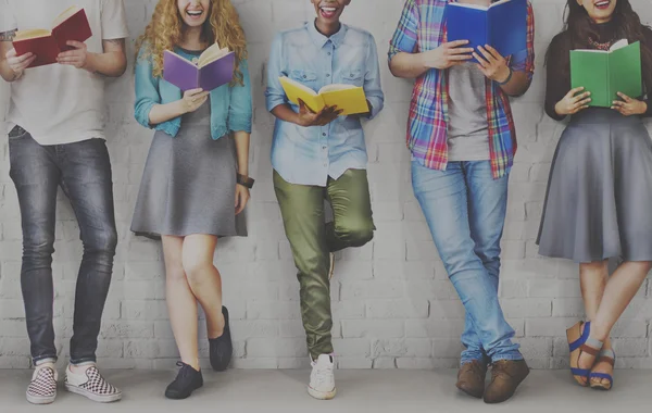 Diversity people standing with books