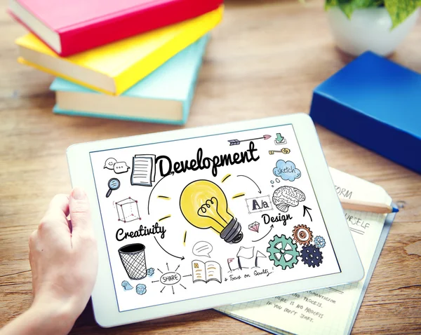 Businessman Using Digital Tablet with Development Concept