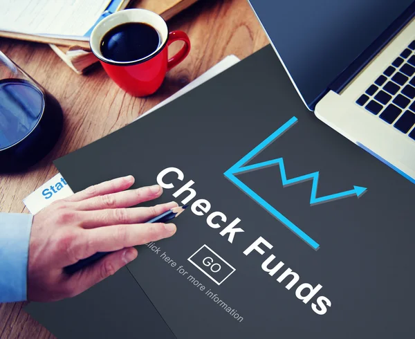 Man working with Check Funds Concept