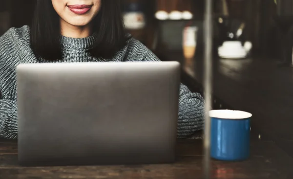 Asian  woman with laptop