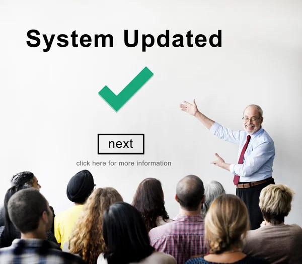 People at seminar with System Updated