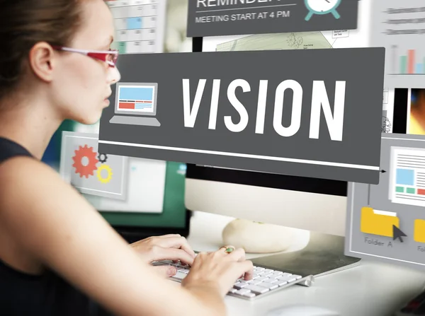 Businesswoman working on computer with vision