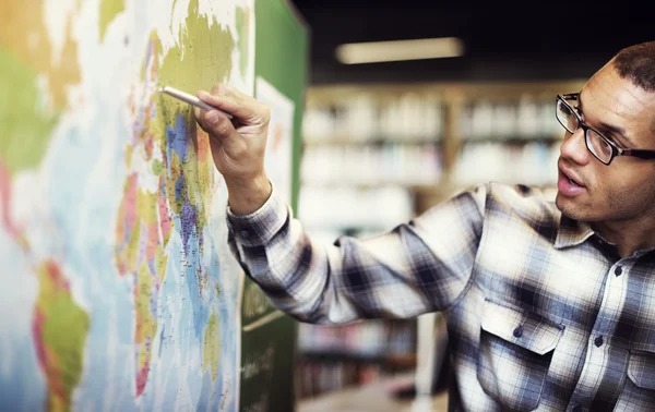 Young Teacher Teaching Geography