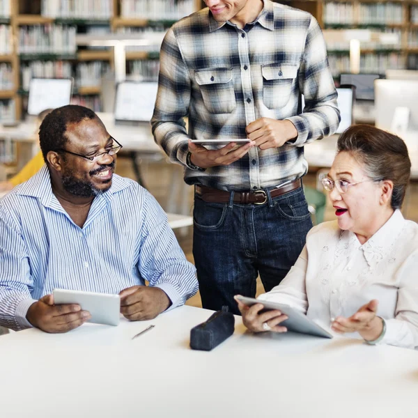 Diversity middle aged people studying