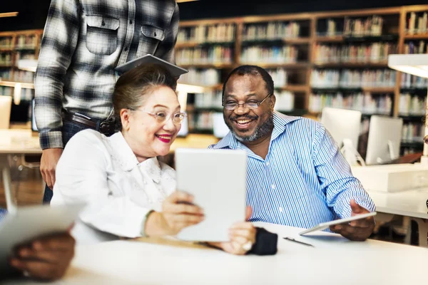 Diversity middle aged people studying