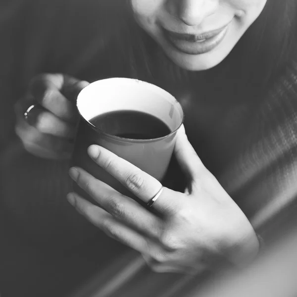 Woman drinking coffee