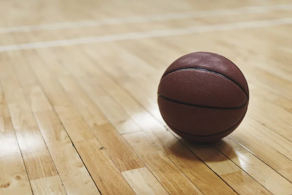 Basketball on wooden floor