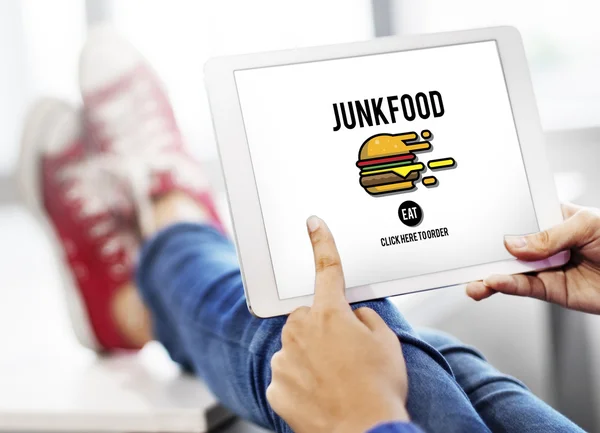 Digital tablet with junk food