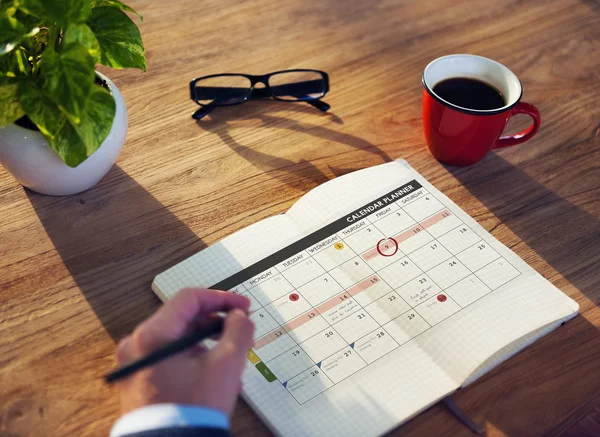 Man working with Calendar Concept