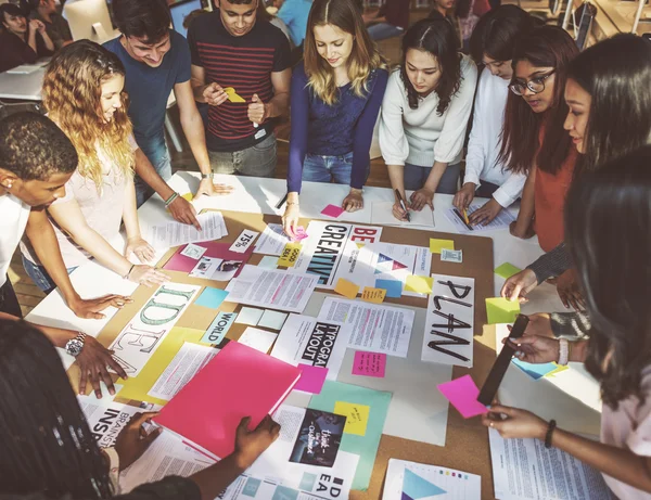 Diversity group of students at workplace table