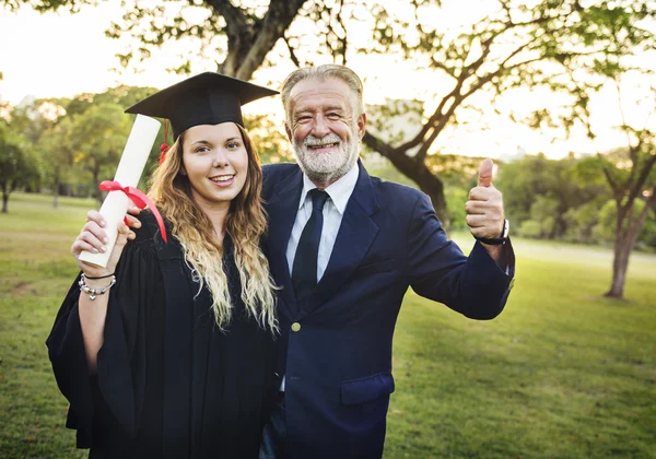 Father and daughter at graduation from University