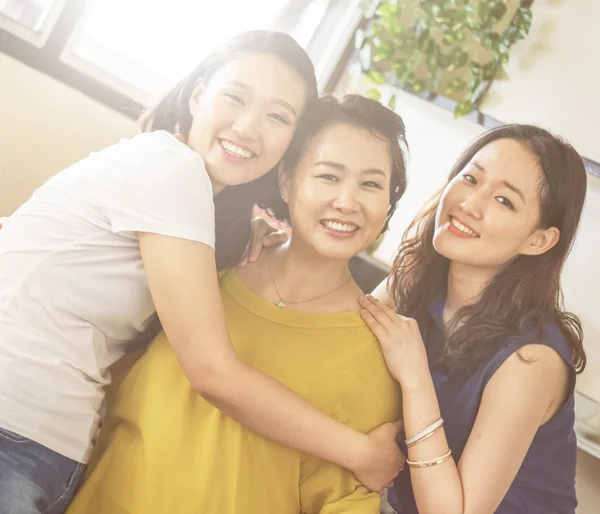 Asian mother with daughters