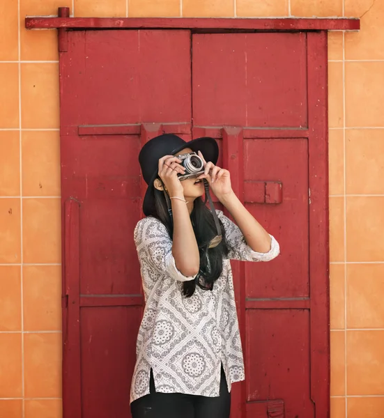 Travel woman with camera