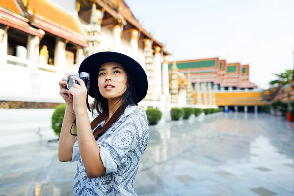 Travel woman with camera