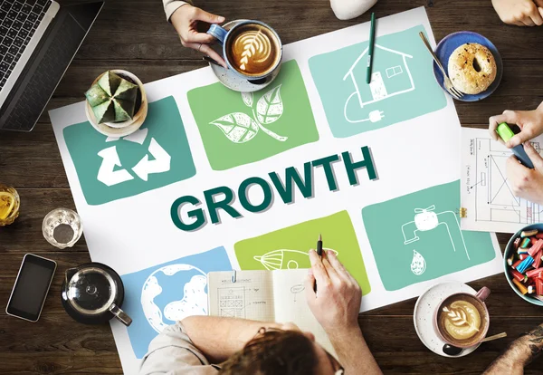 Table with poster with Growth