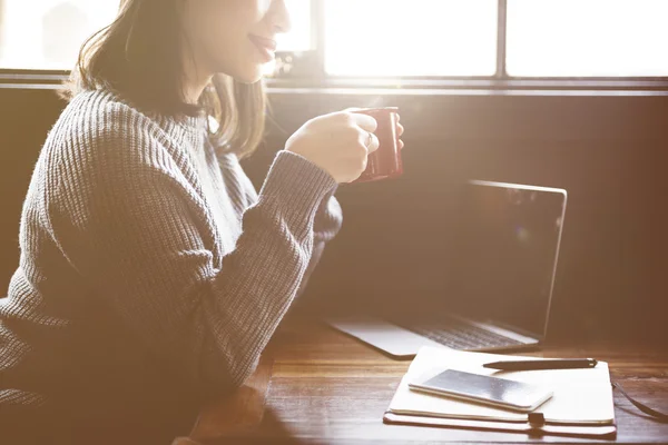 Woman working with laptop