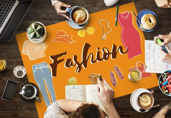 Table with poster with Fashion