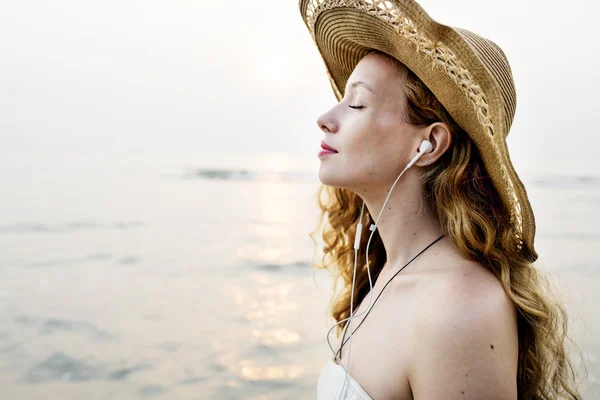 Woman listening music and dreaming