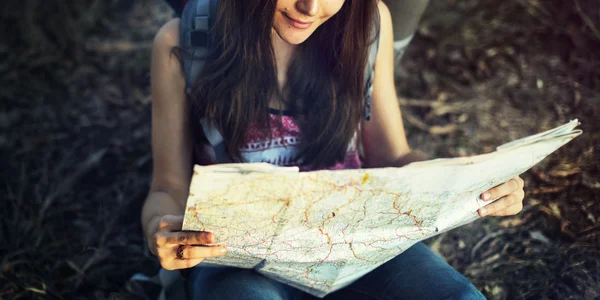 Girl reading Map aoutdoor