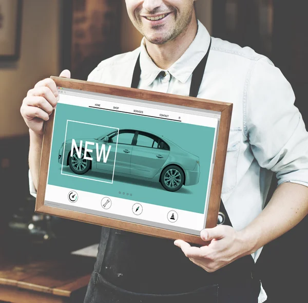 Barista holding board with text