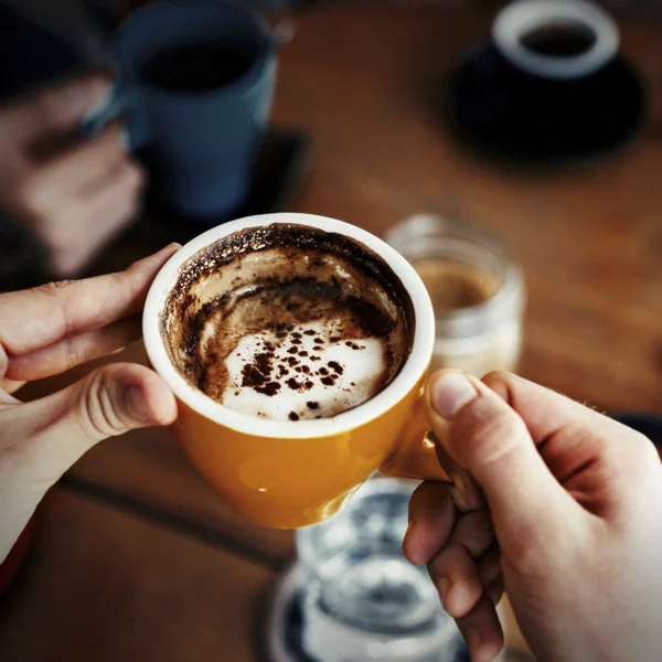 Cup of coffee in hands