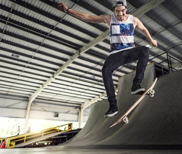 Man jumping with skateboard