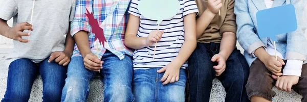 Hipster Kids seating together