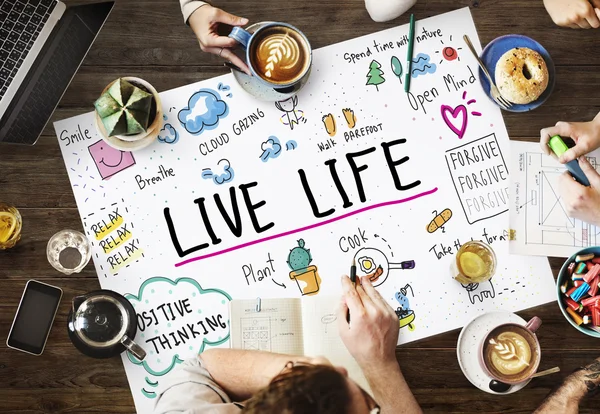 Table with poster with Live Life