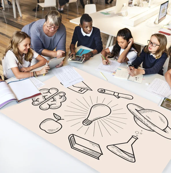 Teacher with pupils at school