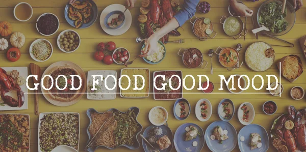 Table with food and Good Mood Concept