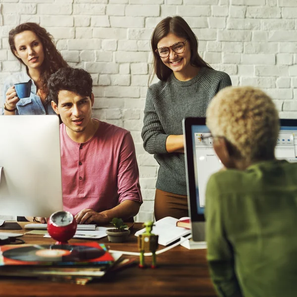 Hipsters working in Contemporary office