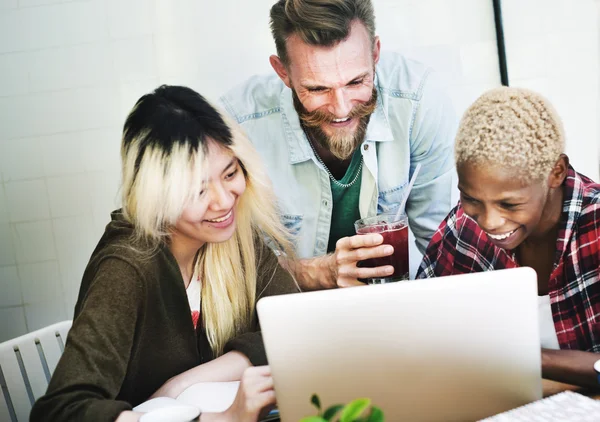 Young people using laptop