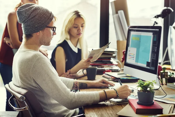 Hipsters working in Contemporary office