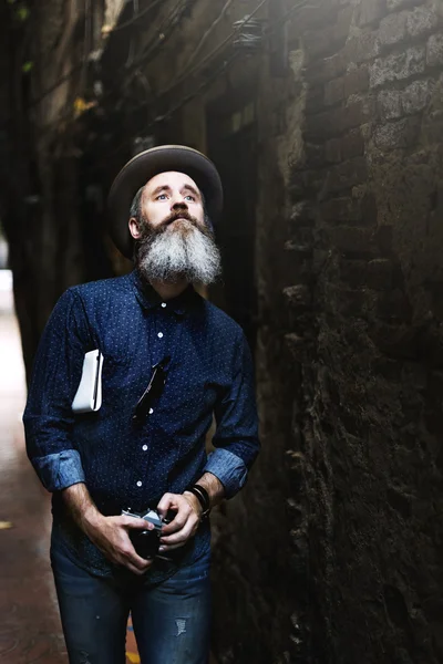 Man Hipster Traveling with camera