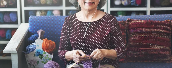 Woman Knitting Scarf
