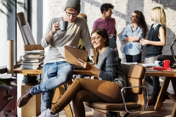 Hipsters working in Contemporary office