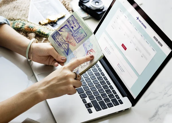 Woman with passport in hands