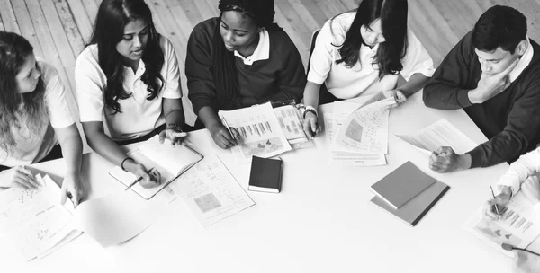 Students learning in university class