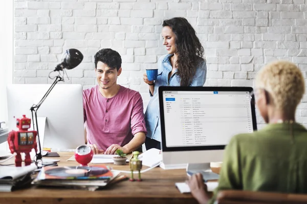 Hipsters working in Contemporary office